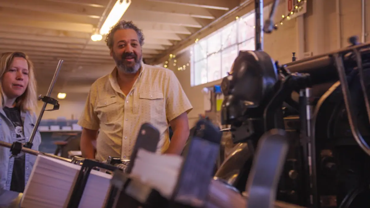 Josh Crumpton filming No Small Water in a letterpress shop